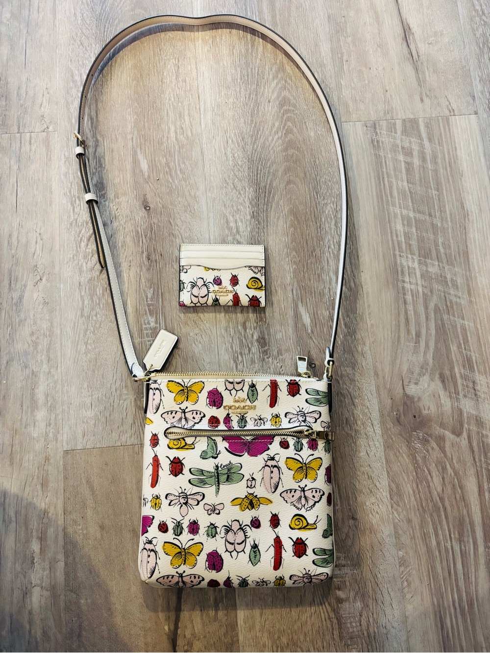 Like New Coach Butterfly & Insect Print Crossbody Bag with matching Id wallet
